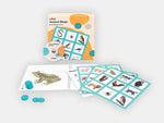 The box and different components from the turquoise Animal Bingo Game.