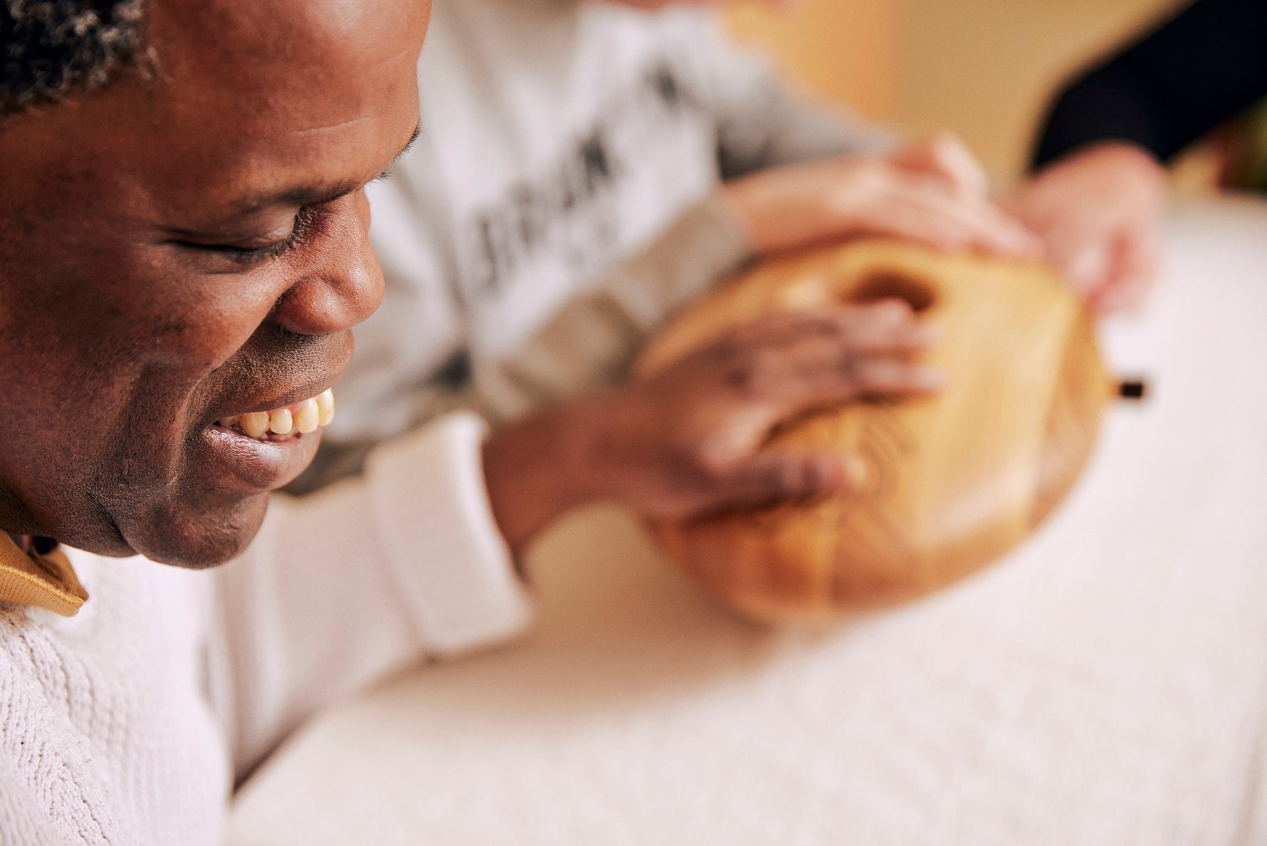 Man holding the Crdl with a blurred background