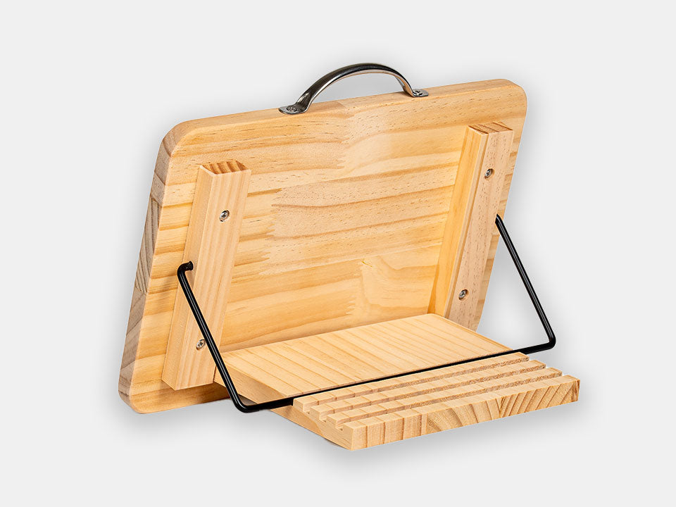 The back view of the wooden sensory busy board, its angle-adjusting mechanism, and the handle for easy transport.