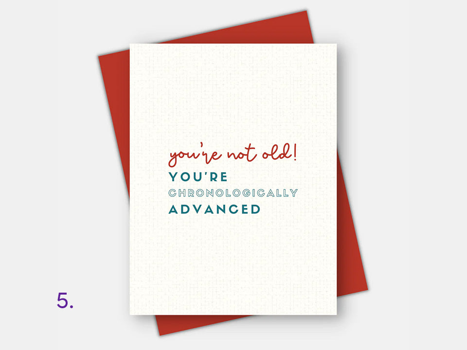 Age friendly Birthday Card: ''You're not old you're chronologically advanced'' with a blue envelope.