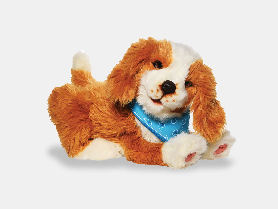 Freckled Pup from Joy For all, waging its tail to promote sensory engagement.