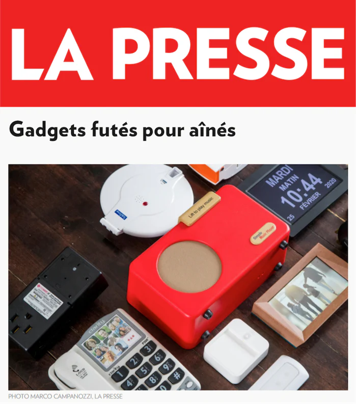 Advertisement for 'Gadgets futés pour açnés' with a red box and other electronic items on a wooden surface, featuring 'La Presse' logo.
