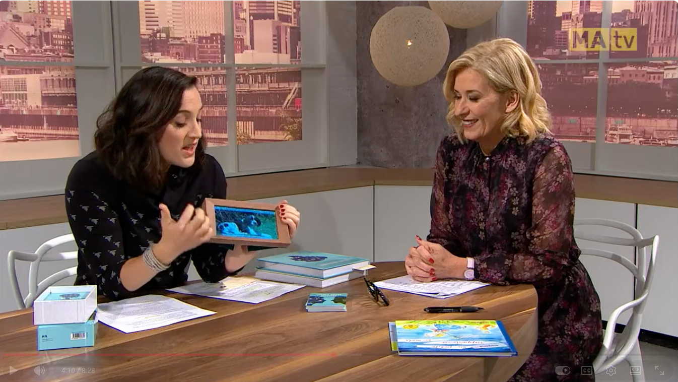 Two women in a studio setting showing the Eugeria products