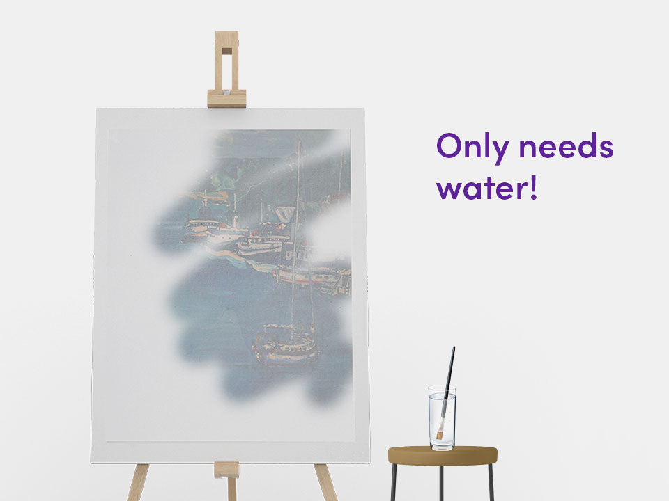 A stroke of water from a paintbrush magically revealing a part of the wet reveal canvas.