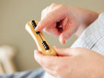 close up of hands playing with one fidget widget
