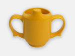 Front view of the yellow two-handle dignity cup that helps prevent spills and maintaind independance.
