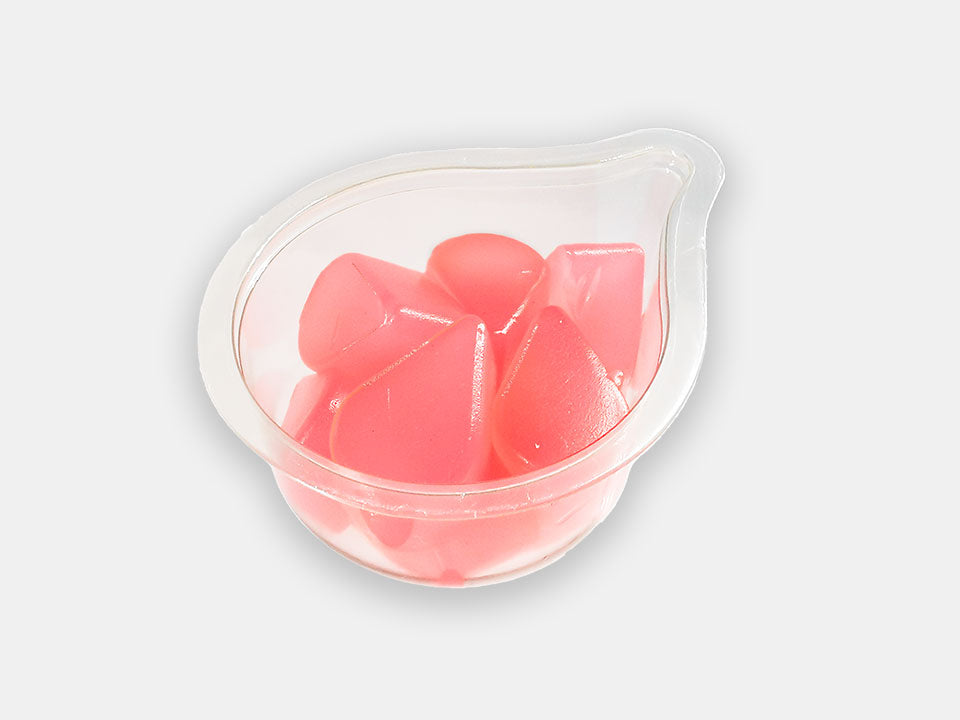 A raspberry flavored pink Jelly Drop snack pot.
