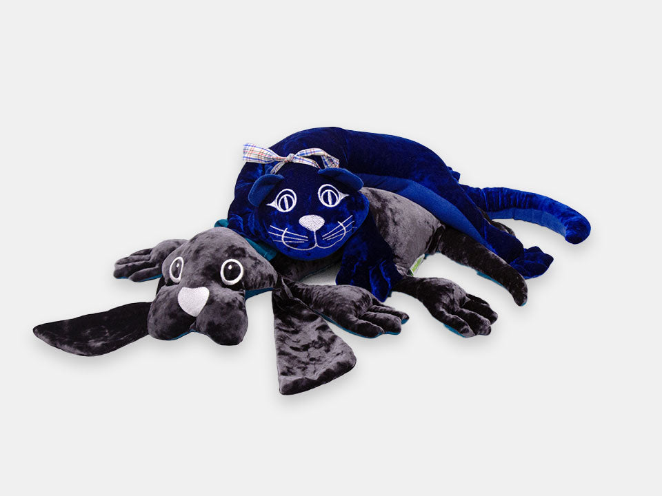 Manimo cat and long-eared dog weighted and comforting plush animals for people living with mid-late stage dementia.