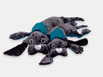 Two Manimo grey plush dogs: comforting with their weight for people living with dementia.